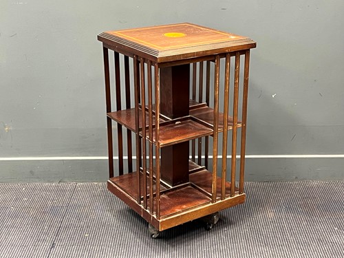 Lot 590 - An inlaid mahogany revolving bookcase 85 x 46...
