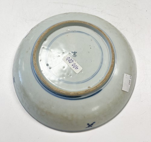 Lot 8 - A Chinese blue and white porcelain Zhangzhou (Swatow) peony dish, 17th/18th century