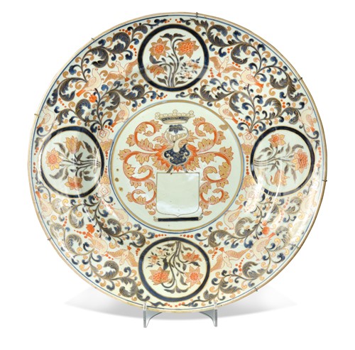 Lot 68 - A Japanese Arita porcelain large armorial dish, early 18th century