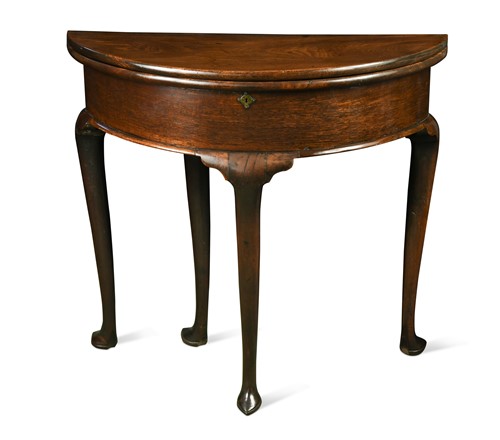 Lot 524 - A George II mahogany tea table