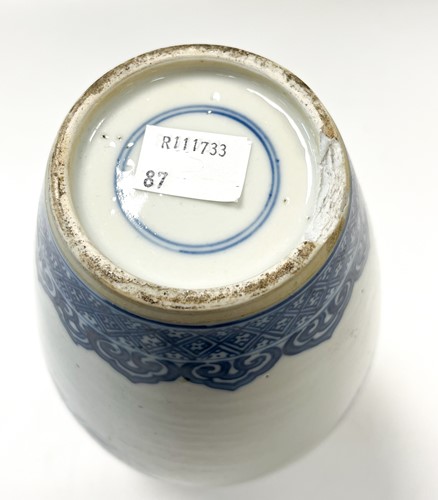 Lot 7 - A Chinese blue and white porcelain skittle vase, Qing Dynasty, 18th century