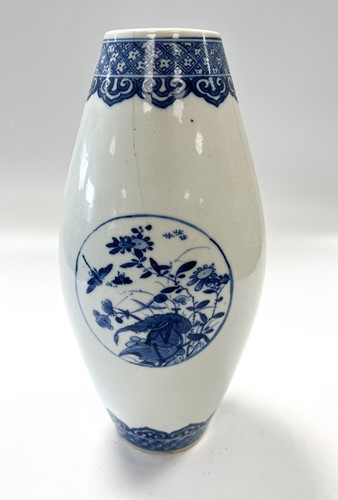 Lot 7 - A Chinese blue and white porcelain skittle vase, Qing Dynasty, 18th century