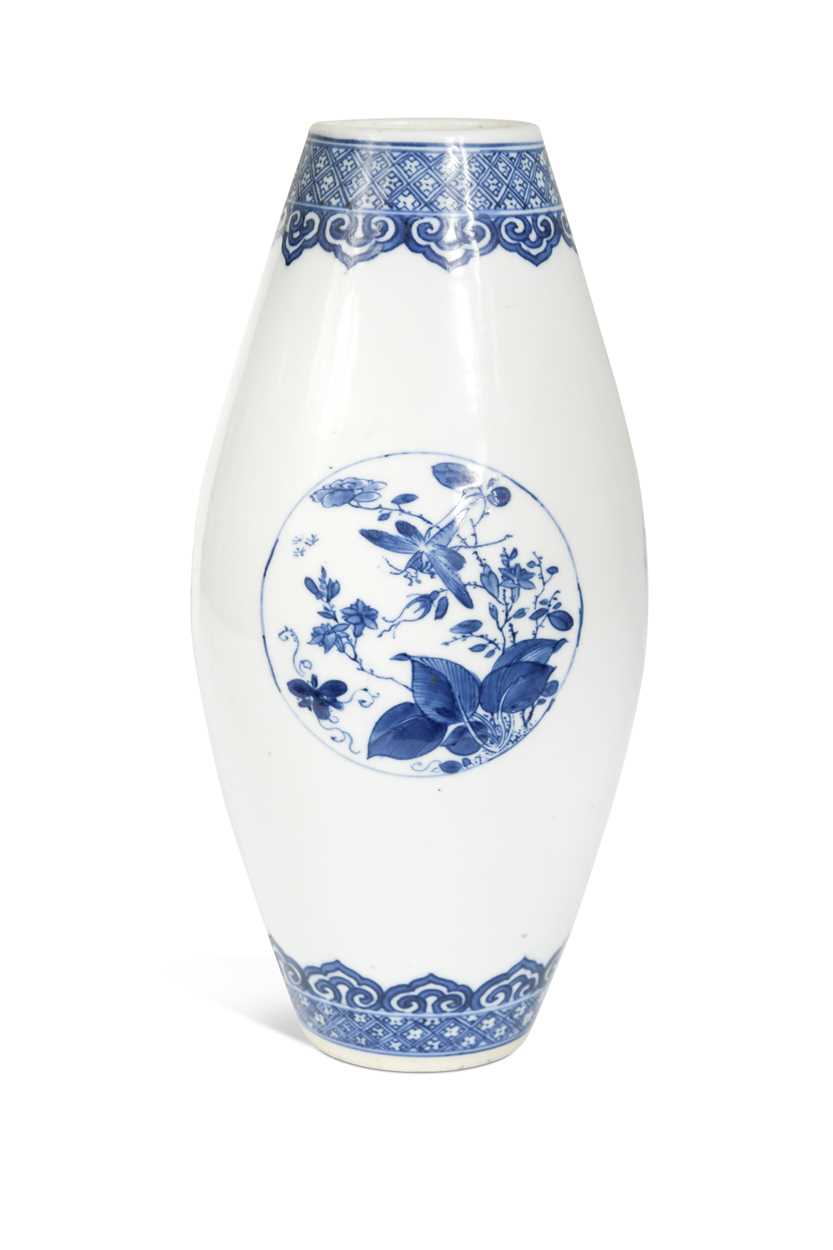 Lot 7 - A Chinese blue and white porcelain skittle vase, Qing Dynasty, 18th century