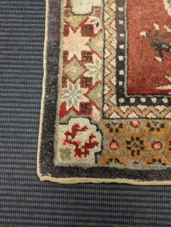 Lot 450 - A Sino-Tibetan wool rug, early 20th century