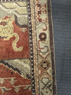 Lot 450 - A Sino-Tibetan wool rug, early 20th century