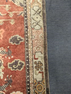 Lot 450 - A Sino-Tibetan wool rug, early 20th century