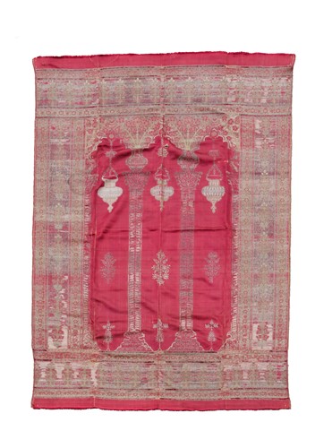 Lot 79 - An Ottoman red silk and woven prayer hanging, 19th century