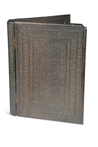 Lot 92 - An Indian carved hardwood book cover, 19th century