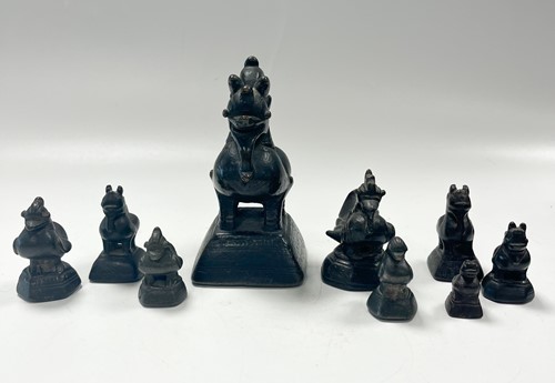 Lot 94 - A set of nine Burmese 'opium' weights, 19th century