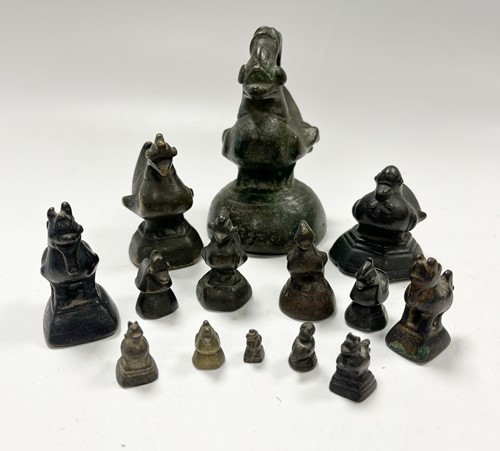 Lot 32A - A set of fourteen Burmese 'opium' weights,...