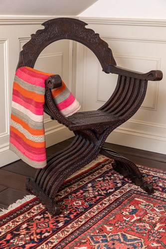Lot 648 - A Savonarola carved wood armchair, circa 1900