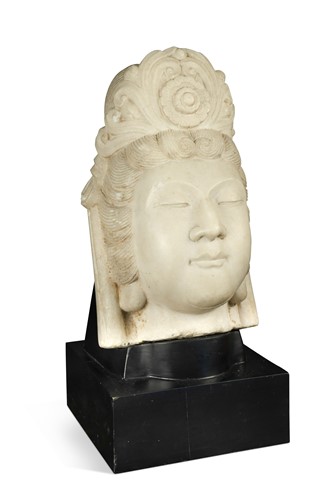 Lot 52 - A carved marble head of the Bodhisattva Avalokitesvara known as Guanyin, circa 1900