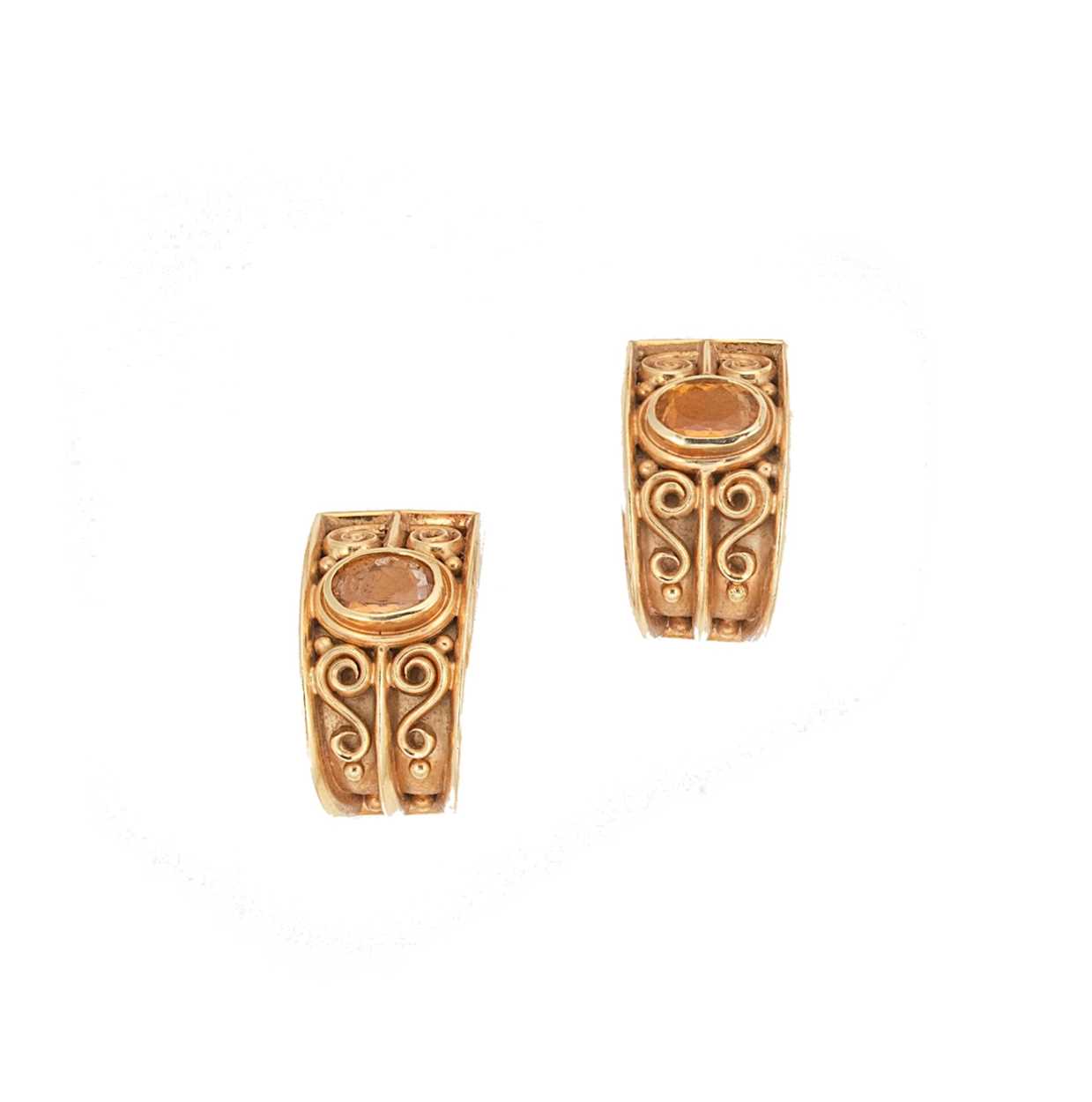 Lot 143 - A pair of topaz ear clips,
