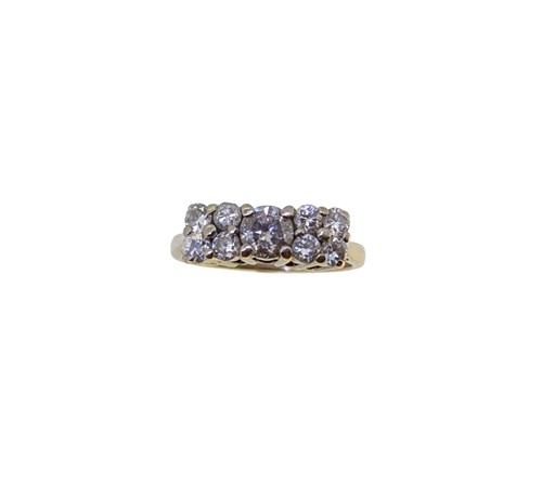 Lot 55 - An 18ct gold nine stone diamond ring