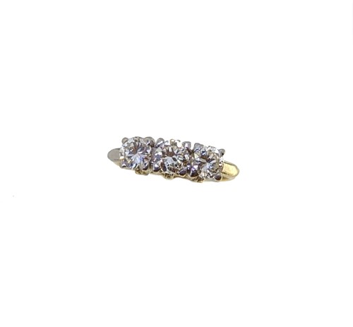 Lot 56 - A three stone diamond ring