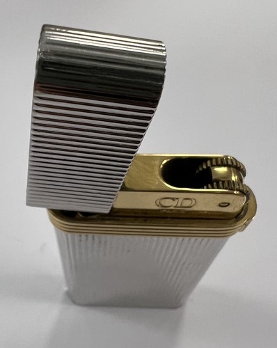 Lot 298 - A Dunhill 'Wheatsheaf rollagas' table lighter,...