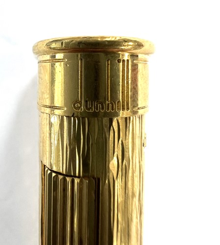 Lot 298 - A Dunhill 'Wheatsheaf rollagas' table lighter,...