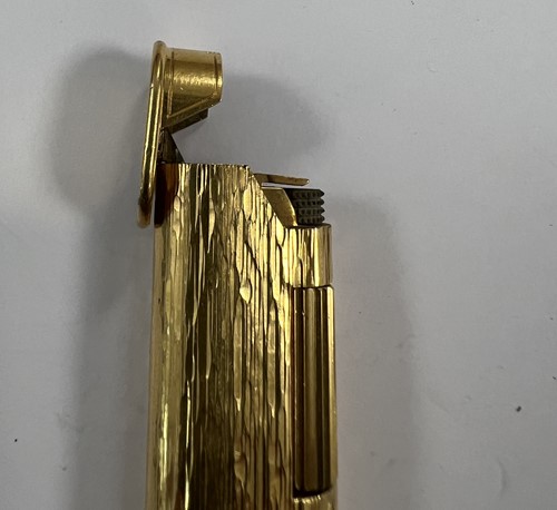 Lot 298 - A Dunhill 'Wheatsheaf rollagas' table lighter,...