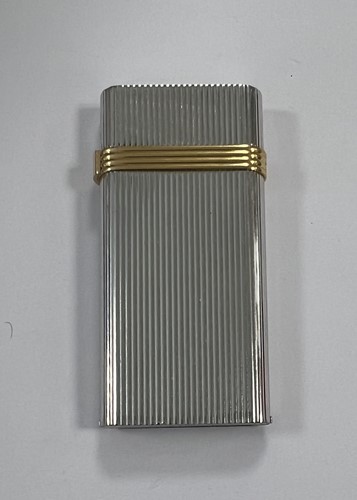 Lot 298 - A Dunhill 'Wheatsheaf rollagas' table lighter,...