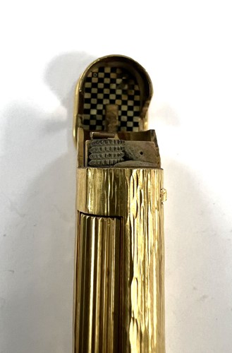 Lot 298 - A Dunhill 'Wheatsheaf rollagas' table lighter,...