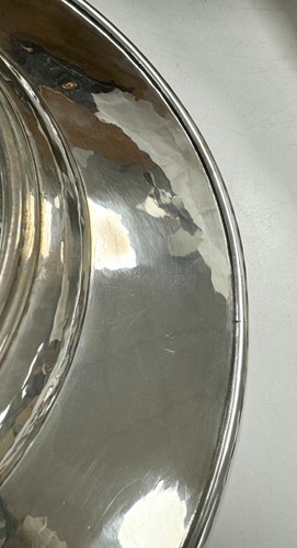 Lot 209 - Omar Ramsden, a near set of Twelve George V and Edward VIII silver dinner plates