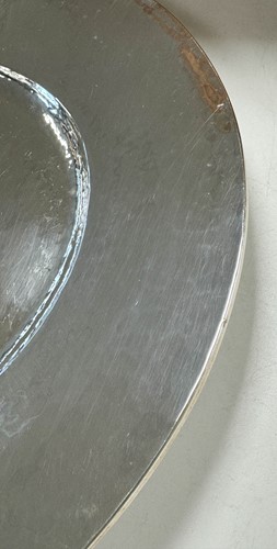 Lot 209 - Omar Ramsden, a near set of Twelve George V and Edward VIII silver dinner plates