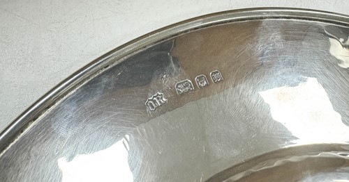 Lot 209 - Omar Ramsden, a near set of Twelve George V and Edward VIII silver dinner plates