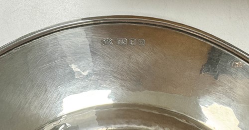 Lot 209 - Omar Ramsden, a near set of Twelve George V and Edward VIII silver dinner plates