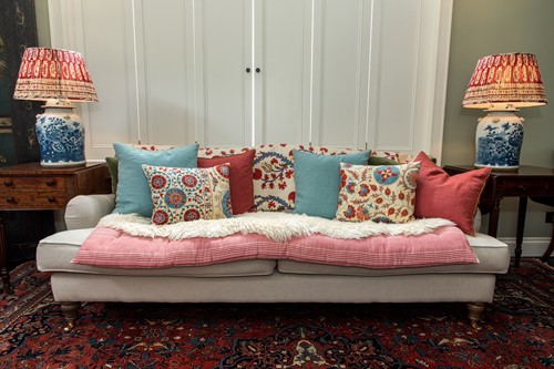 Lot 701 - A three seater sofa, modern