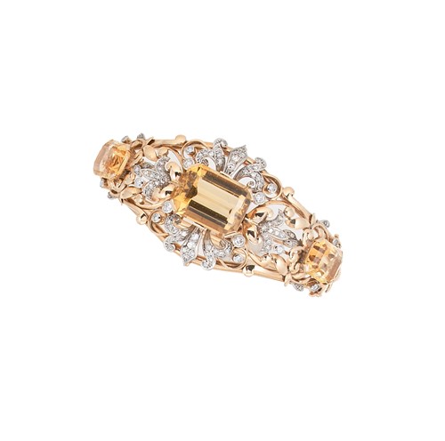 Lot 140 - A citrine and diamond hinged bangle