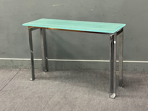 Lot 640 - A Conran glass top rectangular metal frame...