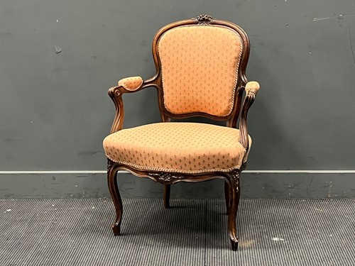 Lot 661 - A French Louis XV style walnut fauteuil...