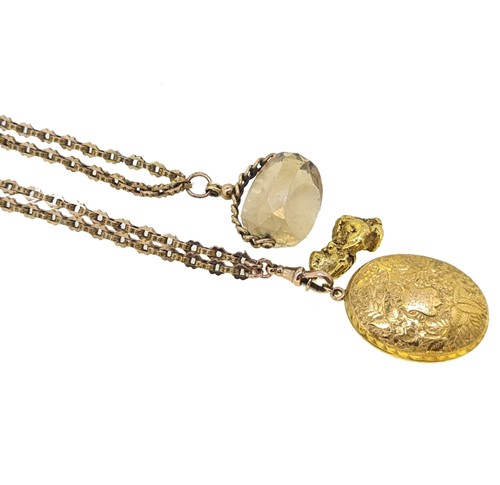 Lot 83 - A guard chain, locket, fob and nugget style pendant