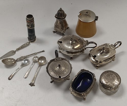 Lot 305 - A collection of silverware including cruets,...