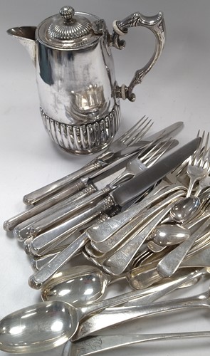 Lot 310 - A collection of silver cutlery and flatware,...