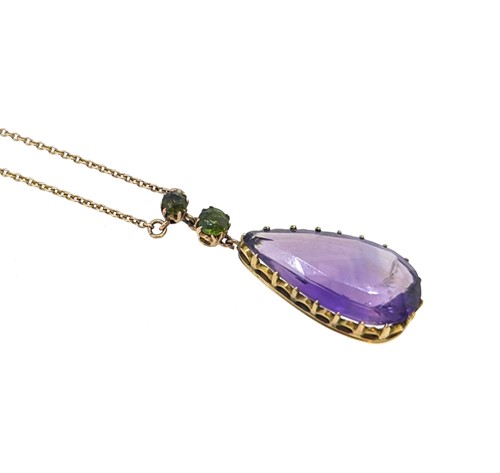 Lot 93 - An amethyst and peridot pendant and chain