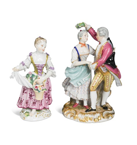 Lot 170 - A Meissen porcelain figure of a young lady holding a flower basket, 19th century