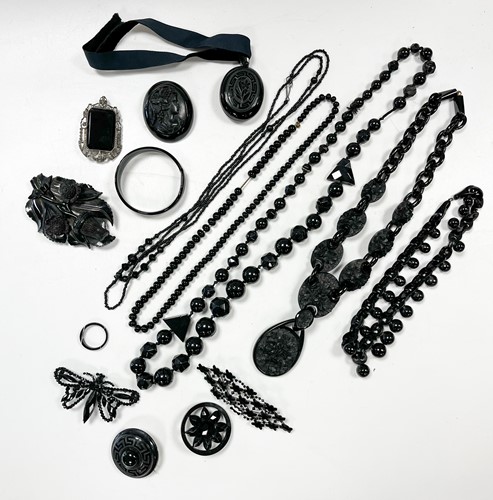 Lot 332 - A collection of jet and imitation jet jewellery