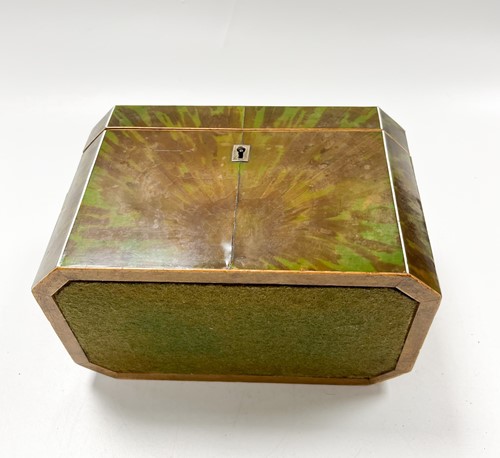 Lot 640 - A George III green stained tortoise shell tea caddy