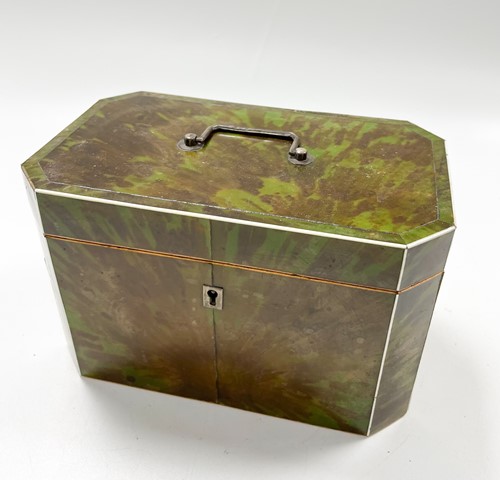 Lot 640 - A George III green stained tortoise shell tea caddy