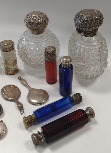 Lot 287 - A collection of silver and metal topped glass...