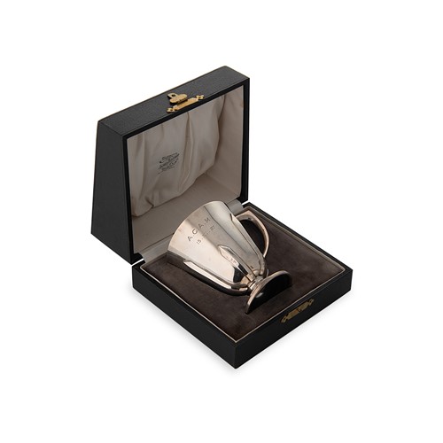 Lot 428 - A cased George V silver christening mug