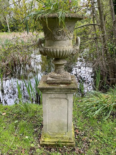 Lot 828 - A reconstituted stone classical style urn, late 20th century