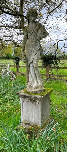 Lot 695 - A reconstituted stone classical style female water carrier, late 20th century
