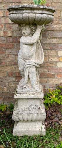 Lot 439 - A composition classical style garden planter with lobed body, late 20th century
