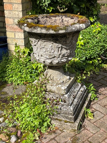 Lot 696 - A reconstituted stone classical style garden urn, late 20th century