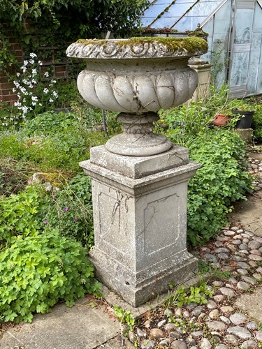 Lot 843 - A reconstituted stone garden planter, late 20th century
