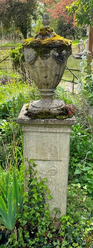 Lot 846 - A reconstituted stone classical style lidded urn, 20th century