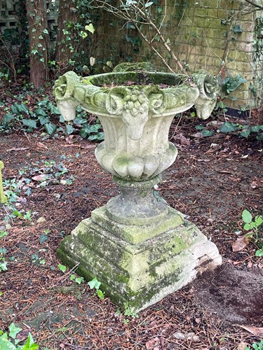 Lot 829 - A reconstituted stone classical style urn, 20th century