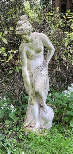 Lot 821 - A reconstituted stone statue of a standing female nude, late 20th century